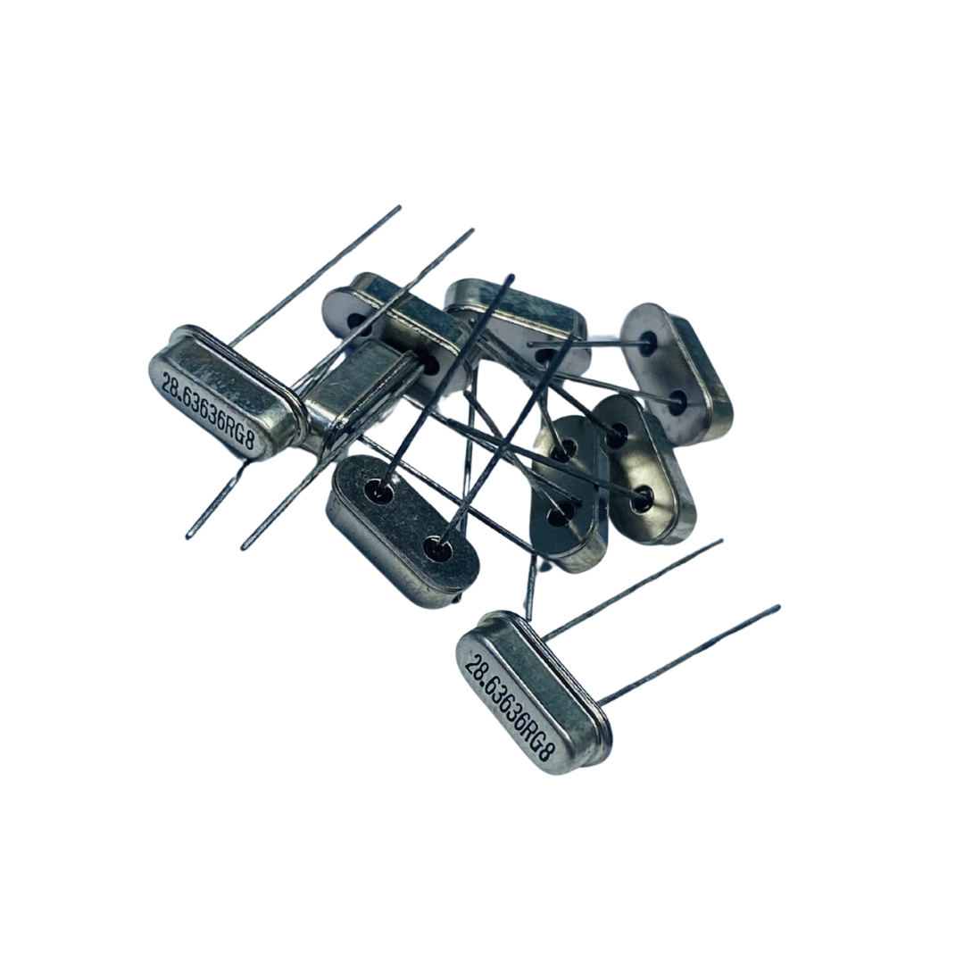 28.63636 MHz crystal, RG8 quartz crystal, RG8 crystal resonator, 28.63636 MHz oscillator crystal, through hole quartz crystal, PCB crystal component, RF timing crystal, quartz resonator electronics, frequency crystal component, microcontroller crystal oscillator