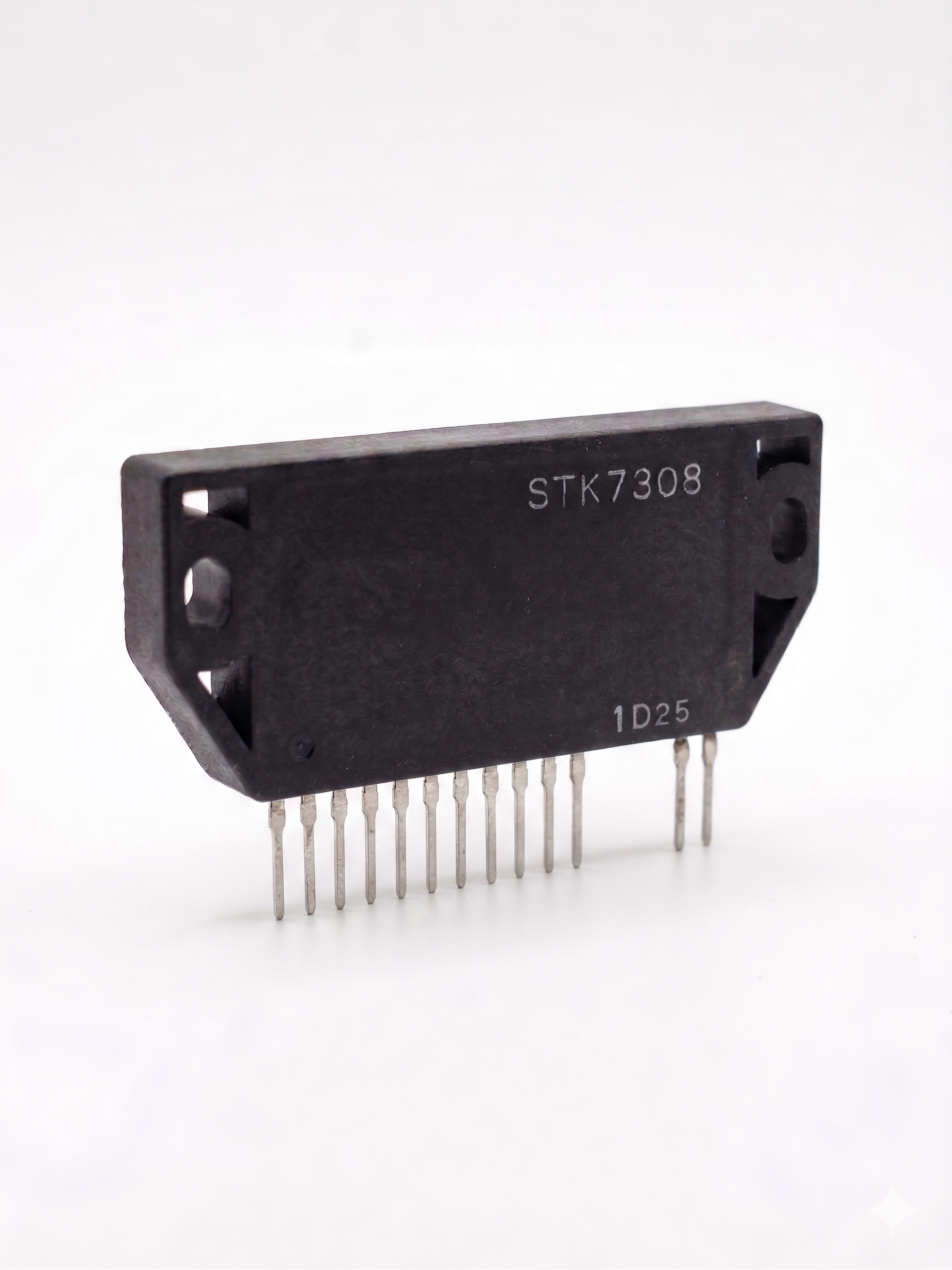 Electronic component with 'STK7308' marking on a white background